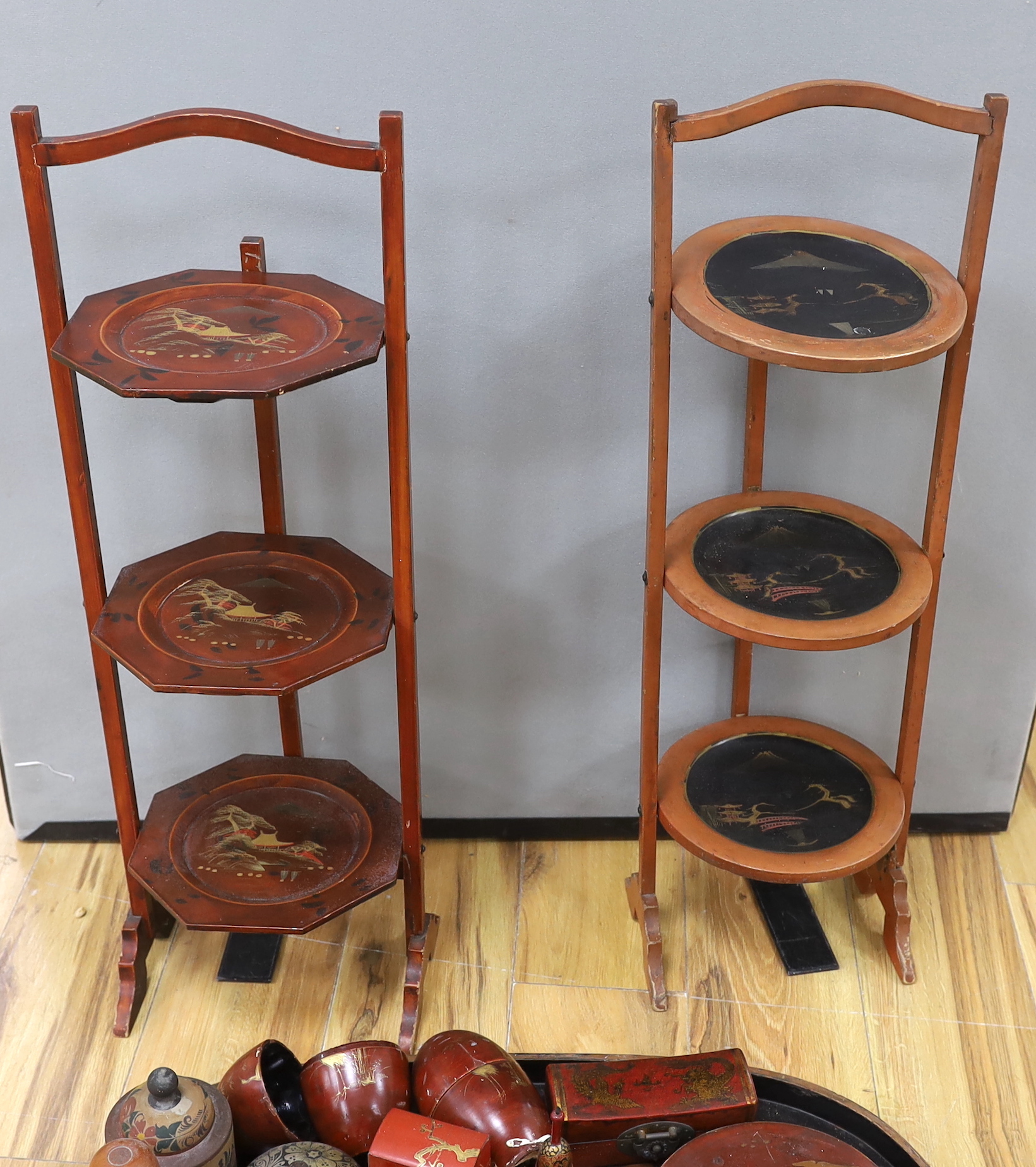 Two chinoiserie lacquer cake stands, a large lacquer tray, a quantity of boxes, blotters, an ink stand, tins etc